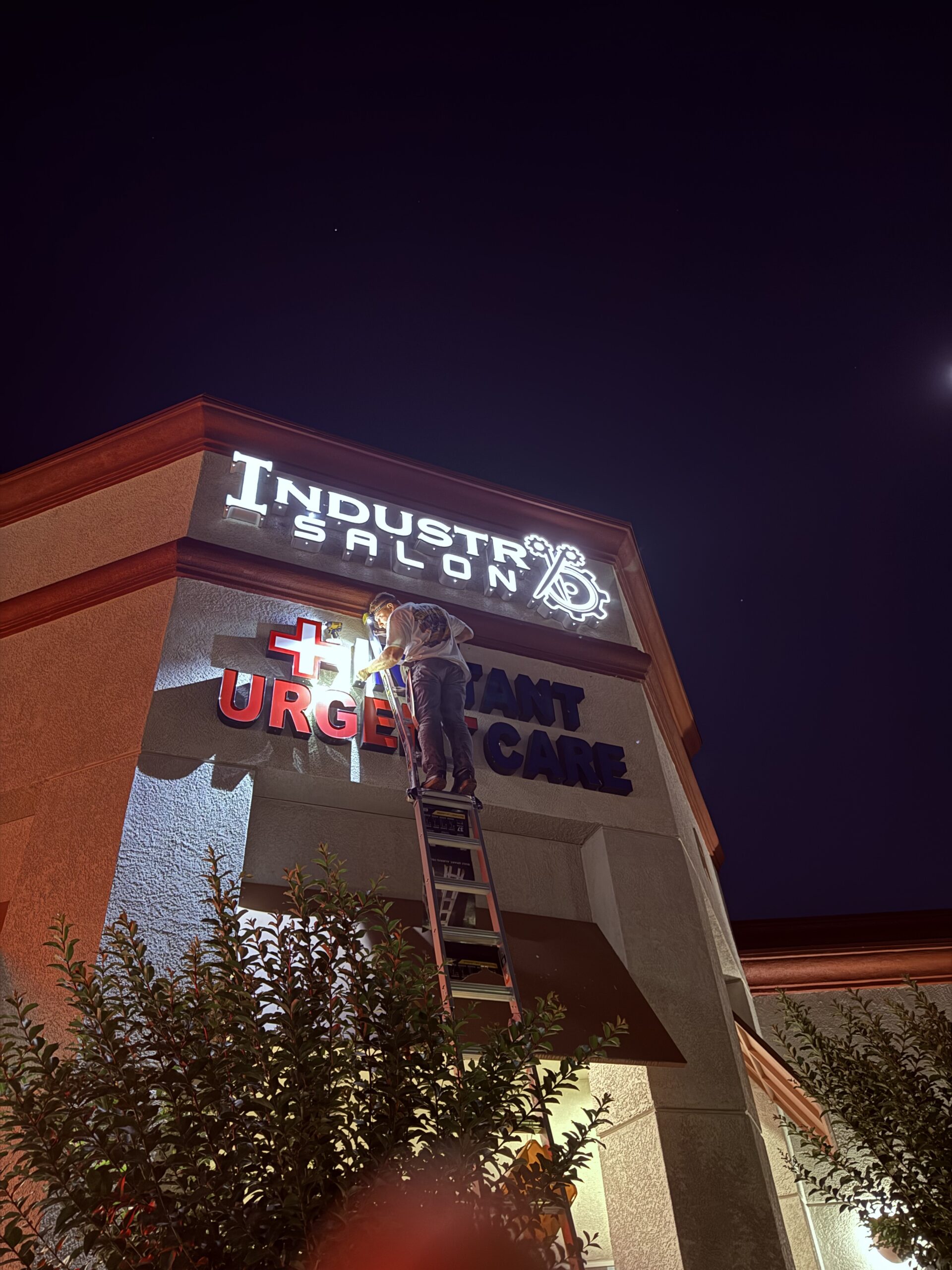 Outdoor signage removal and installation.
