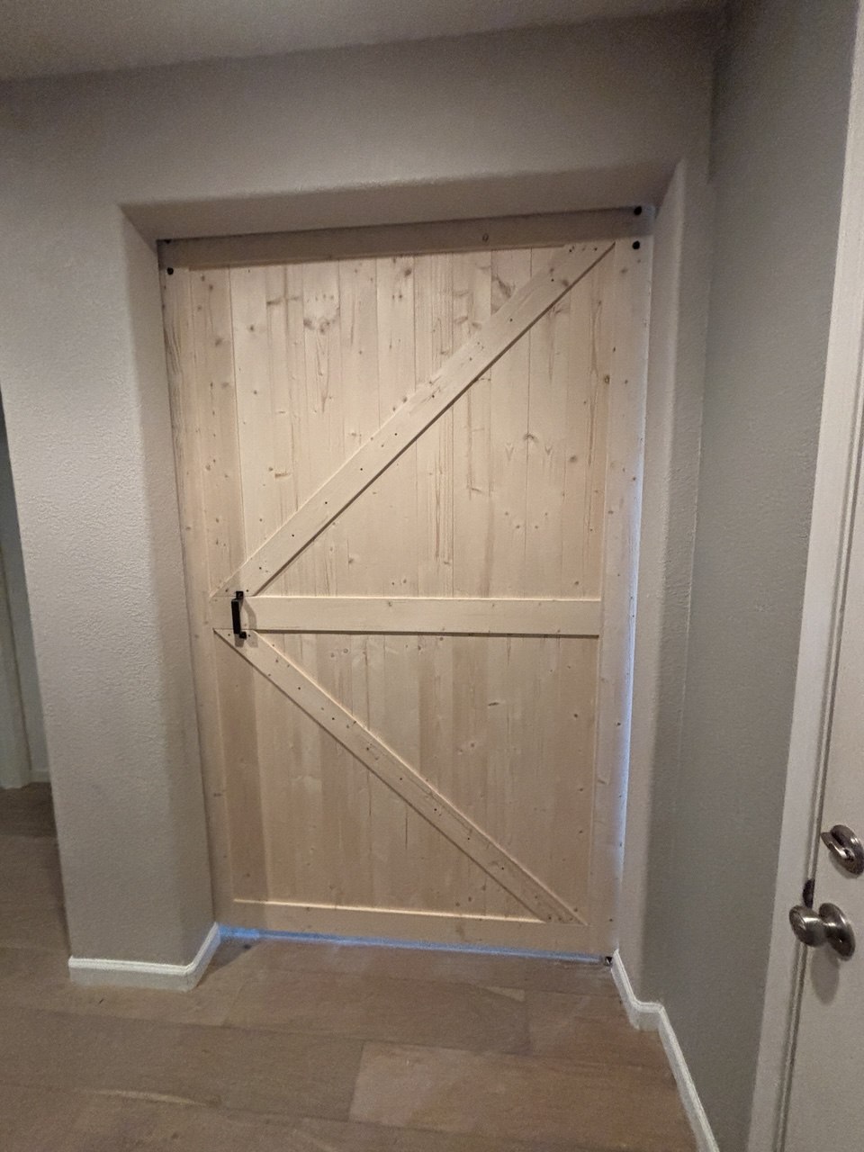 Room partitioning and sliding door installation.